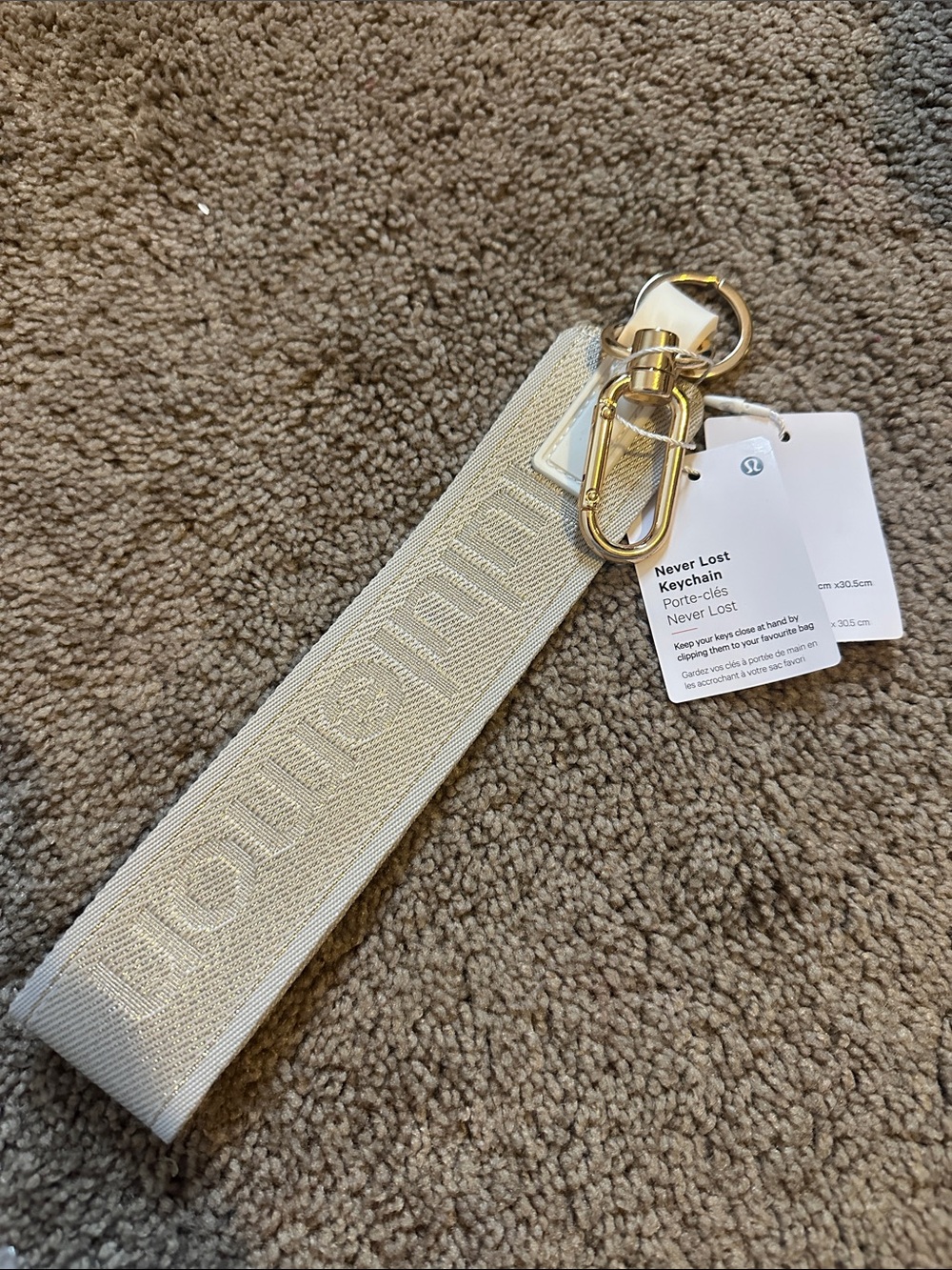 lululemon athletica Never Lost Keychain Wristlet in Beige with Gold Hardware
